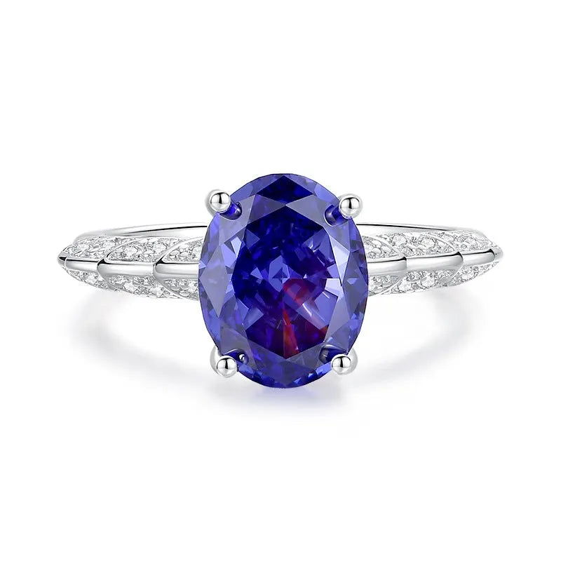 Heart-shaped sterling silver ring with a diamond ice flower cut Tan Sang colour zircon stone.