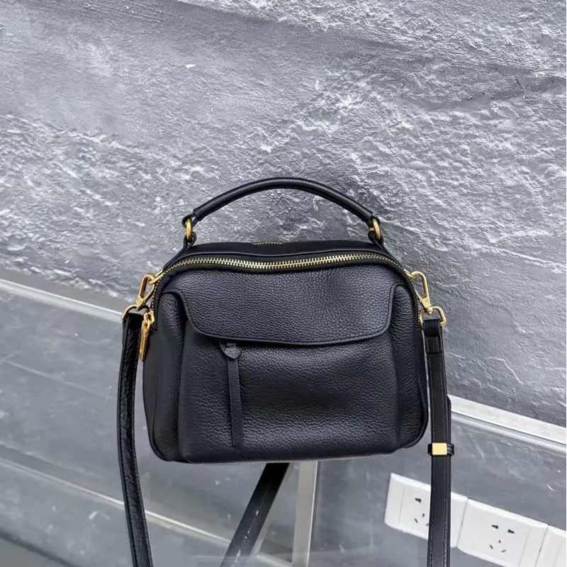 Genuine leather multi-compartment shoulder handbag in almond white with sewing thread detail and outer sandwich pocket