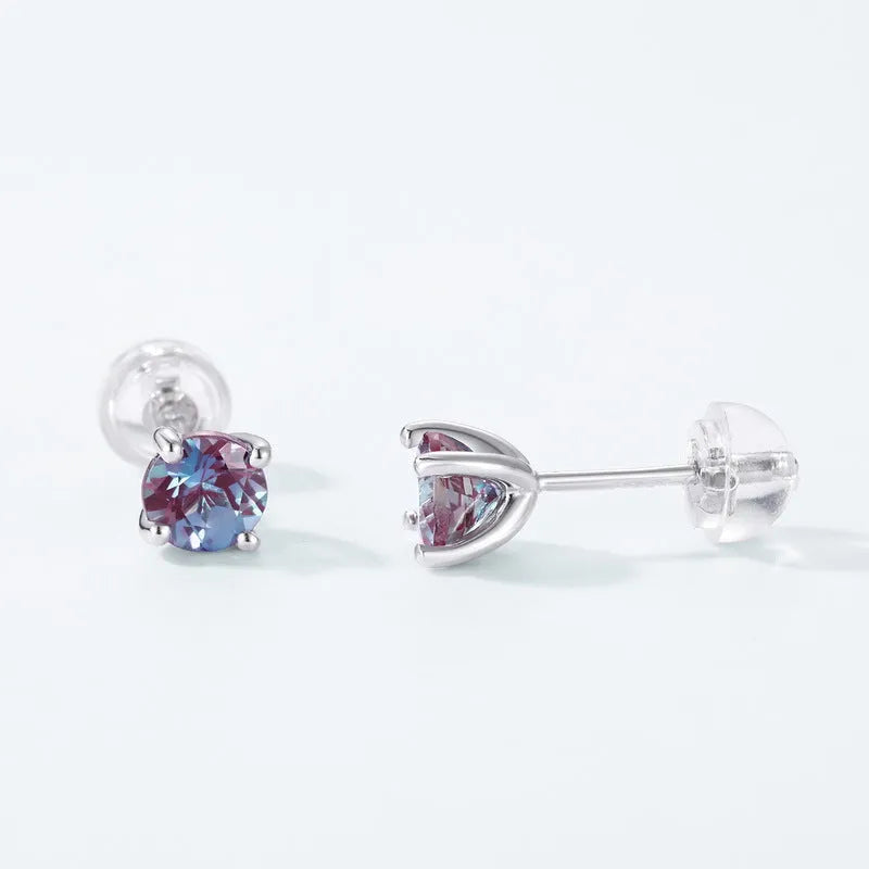 A pair of silver geometric ear studs with a round, coloured Alexander stone setting.