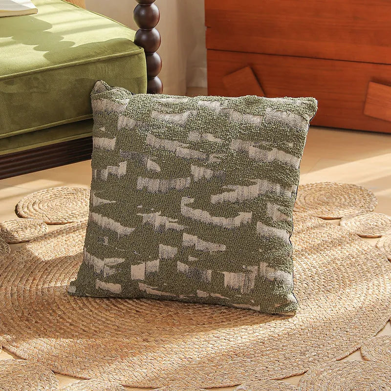 Close-up of a textured jacquard floral pillow cover in a 45cm square size, showcasing yarn-dyed pattern details.