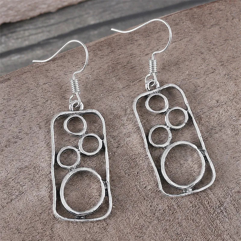 Geometric round ring earrings with irregular square design in antique silver colour