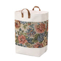 35cm cubed fabric storage bag in a colourful bear print, shown containing a folded quilt.