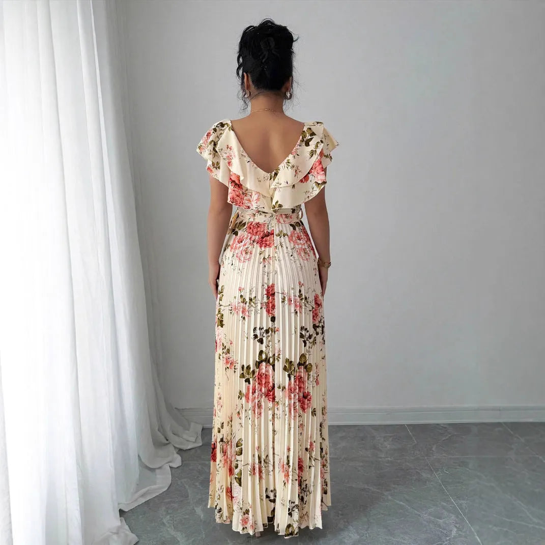 Apricot floral print V-neck dress with ruffled sleeves and a full swing skirt.