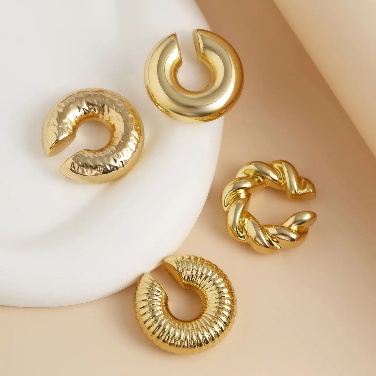 Geometric gold and silver ear clip set for women with non-pierced design