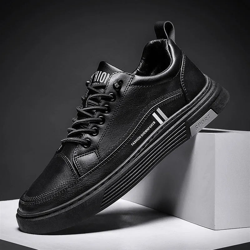 Men's white and black low-top skateboard shoes with an elastic band closure and round toe.