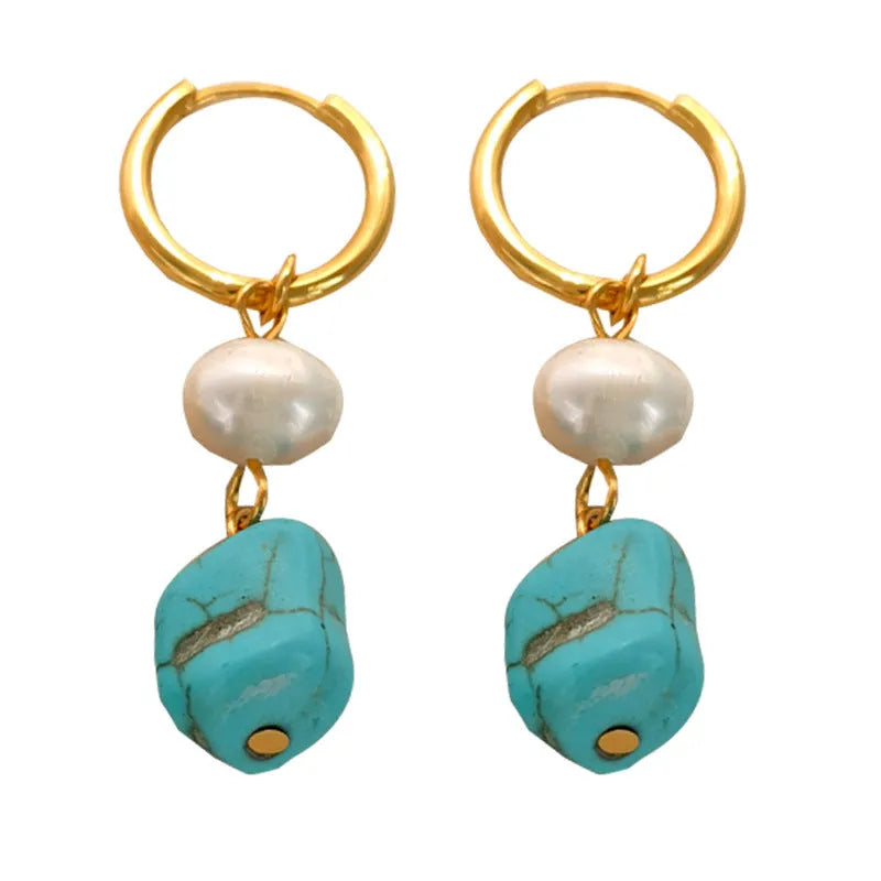 Geometric turquoise and cultured pearl drop earrings and short earrings set on copper base.