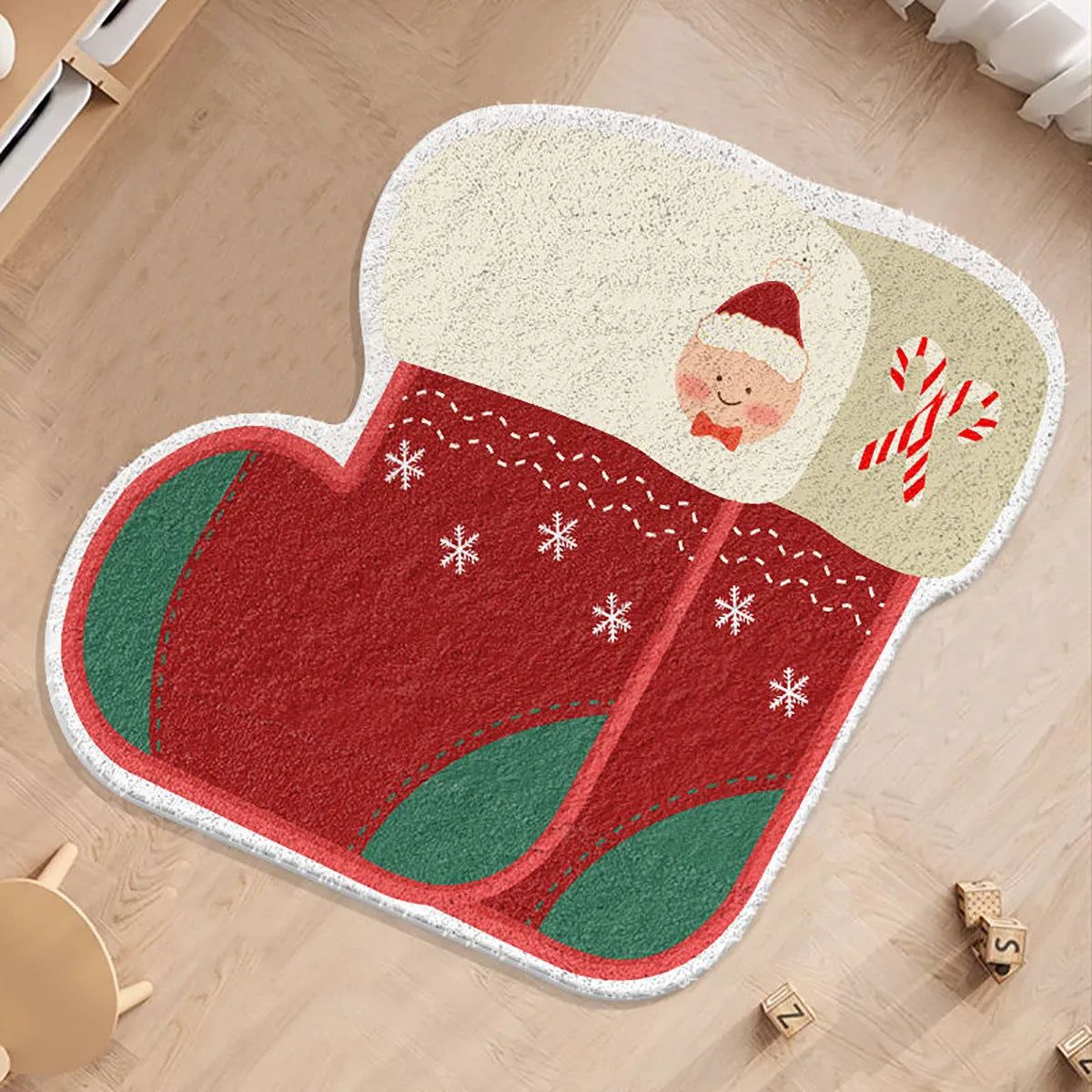 A round alien-shaped Christmas floor mat in imitation cashmere, shown in a festive colour pattern.