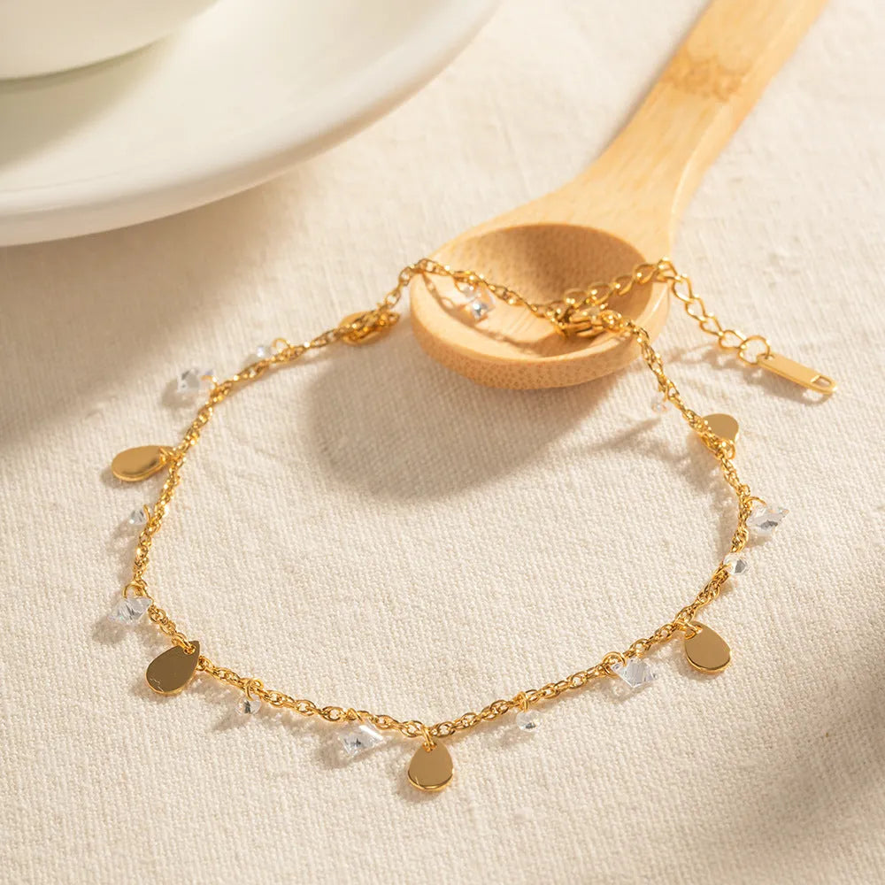 Women's stainless steel anklet with a water drop charm and geometric tassel in colour JDAW2303012.