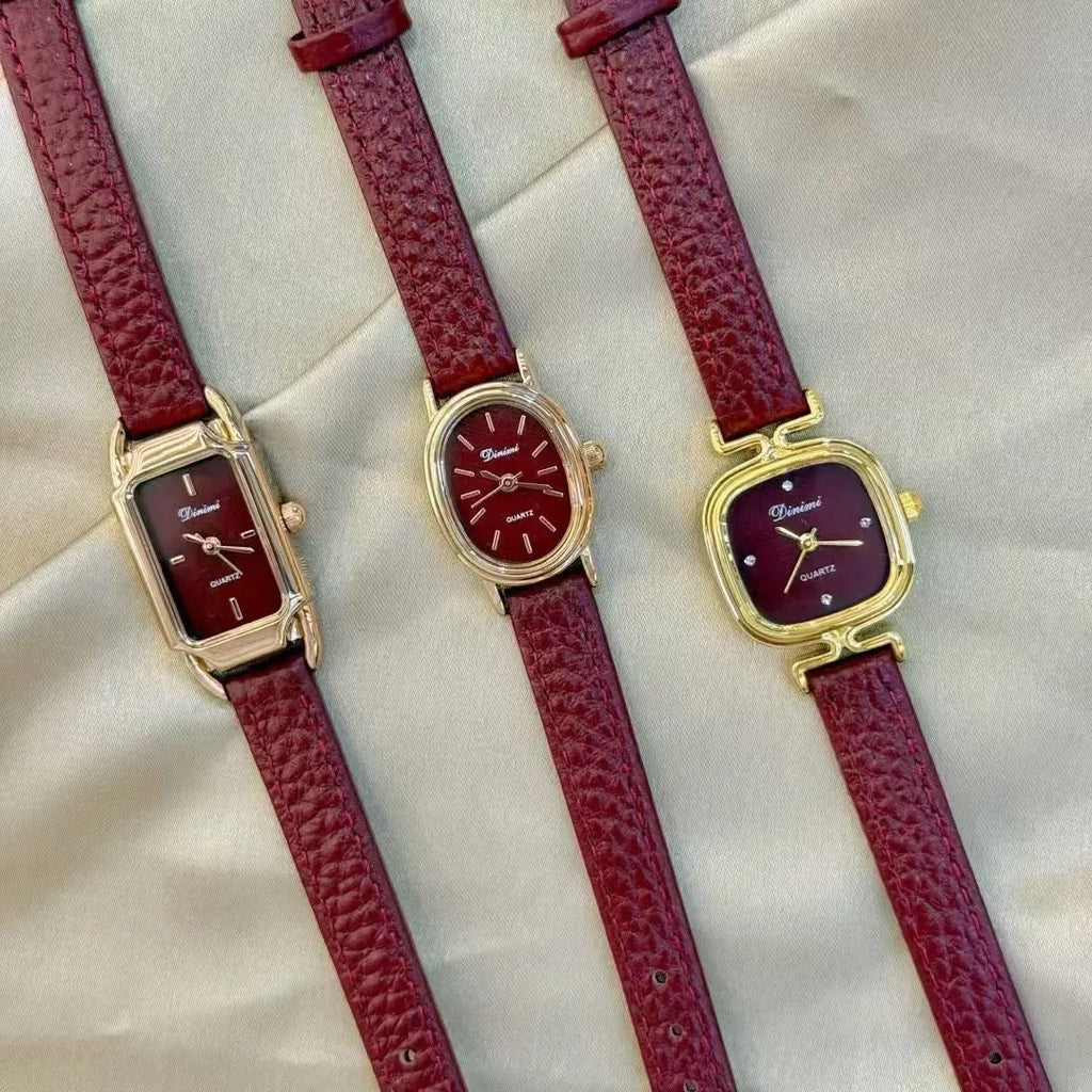 Chinese style red alloy women's wristwatch with a decorative dial on a 8mm thick case.