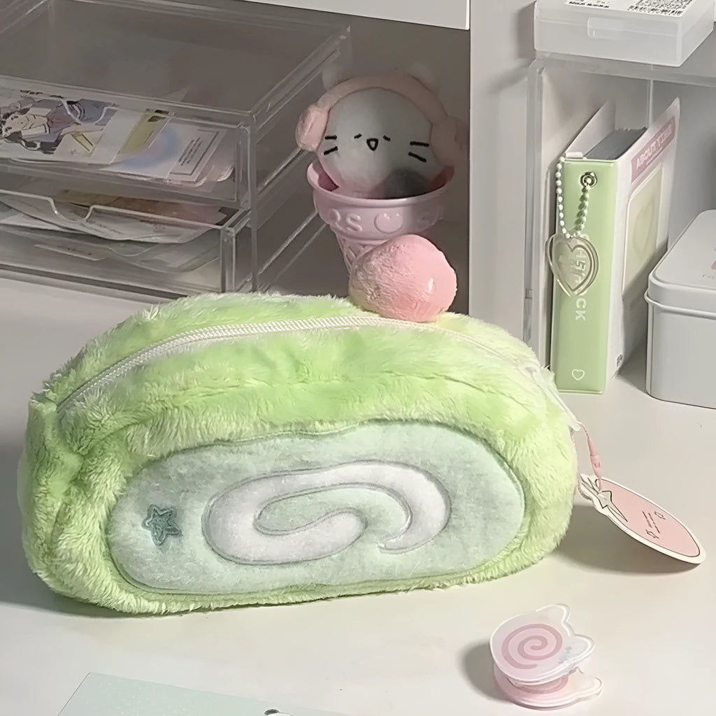 A plush velvet pencil case designed like a Swiss roll cake, in a Korean style.