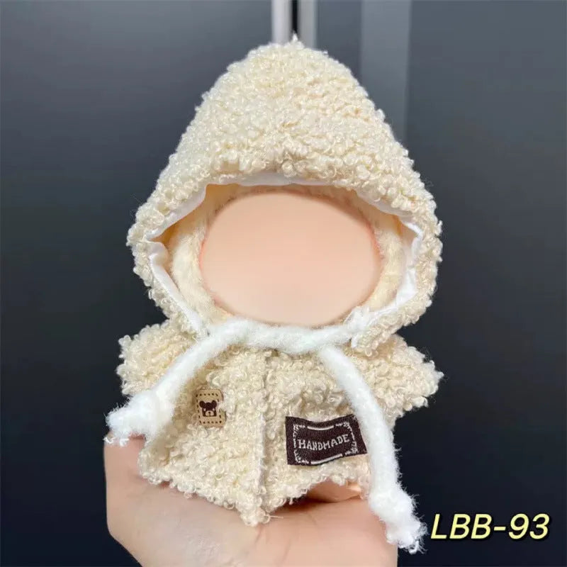 Plastic doll costume for a 17cm tall vinyl figurine on a white background.