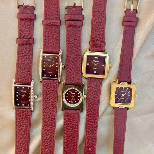 Chinese style red alloy women's wristwatch with a decorative dial on a 8mm thick case.
