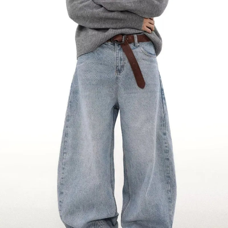 Men's blue straight leg jeans with distressed detailing and micro-elastic fabric