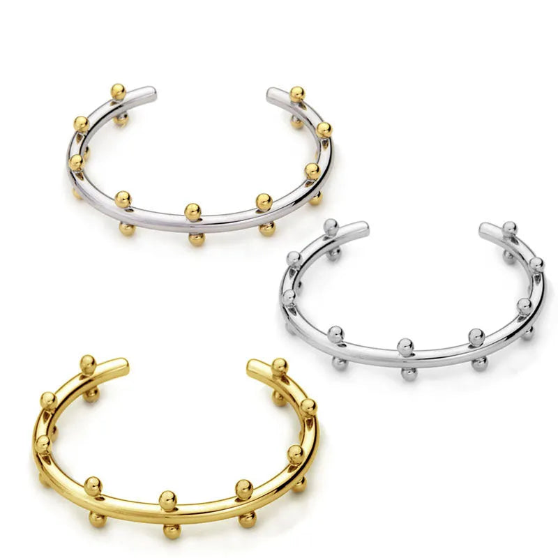 Stainless steel C-shaped bean bead with textured rivet detail for jewellery making