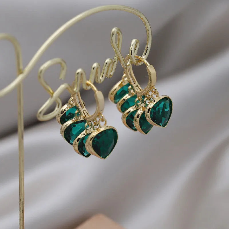 Korean style green heart pendant glass ear clip earrings with copper alloy construction