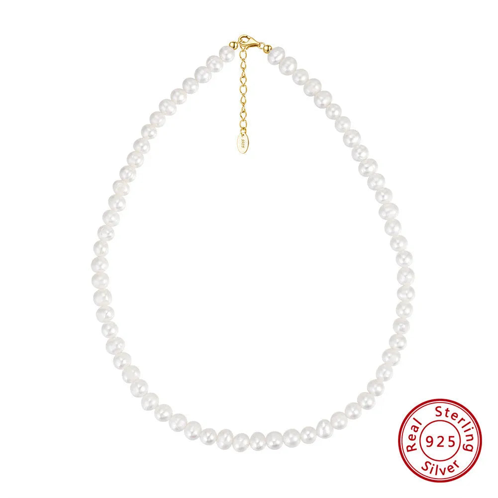 Women's adjustable sterling silver necklace with a 6-7mm freshwater pearl pendant.