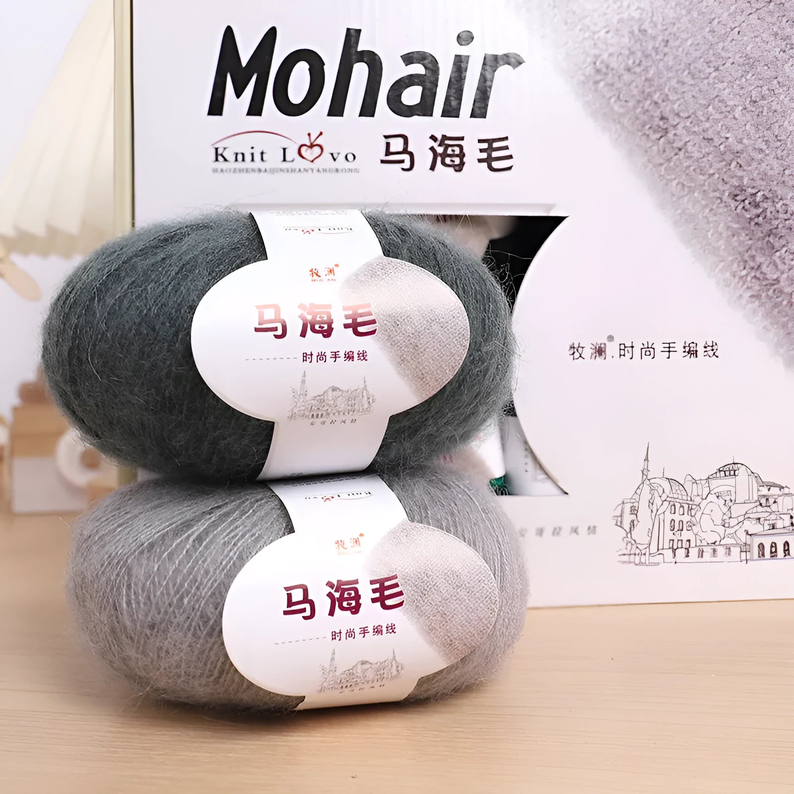 A ball of mohair thread in a chosen colour next to a hand-woven textured scarf sample.