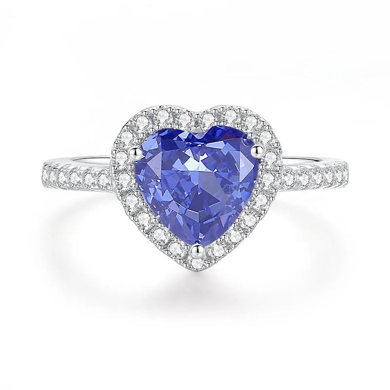 Heart-shaped sterling silver ring with a diamond ice flower cut Tan Sang colour zircon stone.