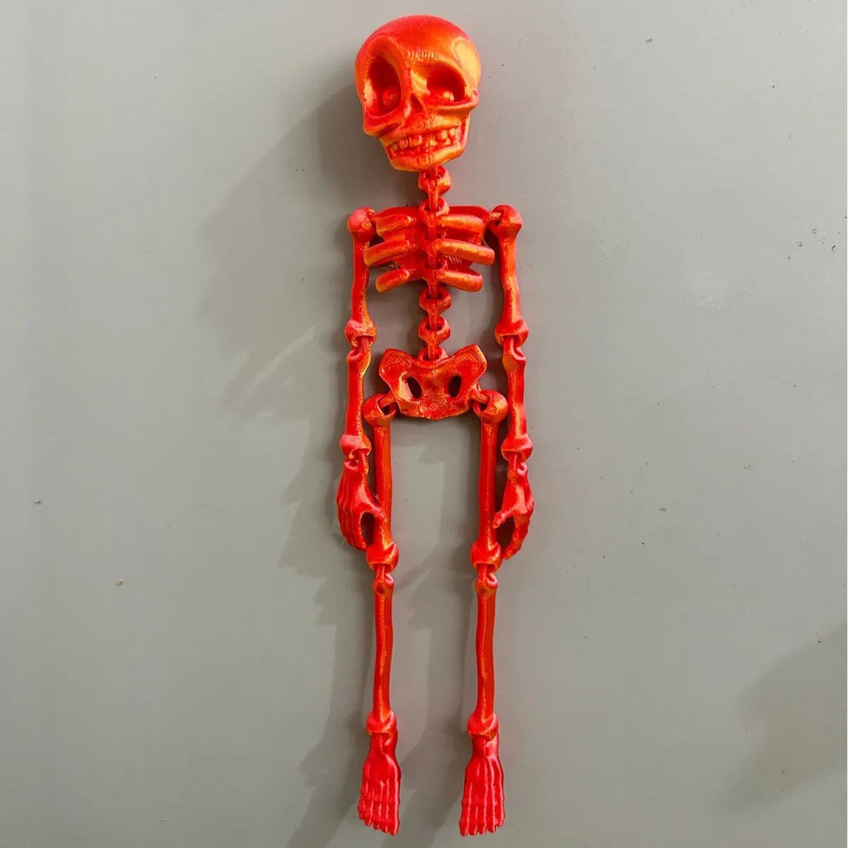 3D printed white skull refrigerator magnet ornament showing detailed modelling, 18cm tall.