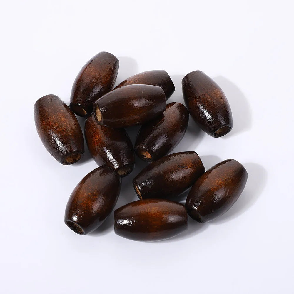 Dark brown oval wooden bead with raised M-shaped profile on a white background.