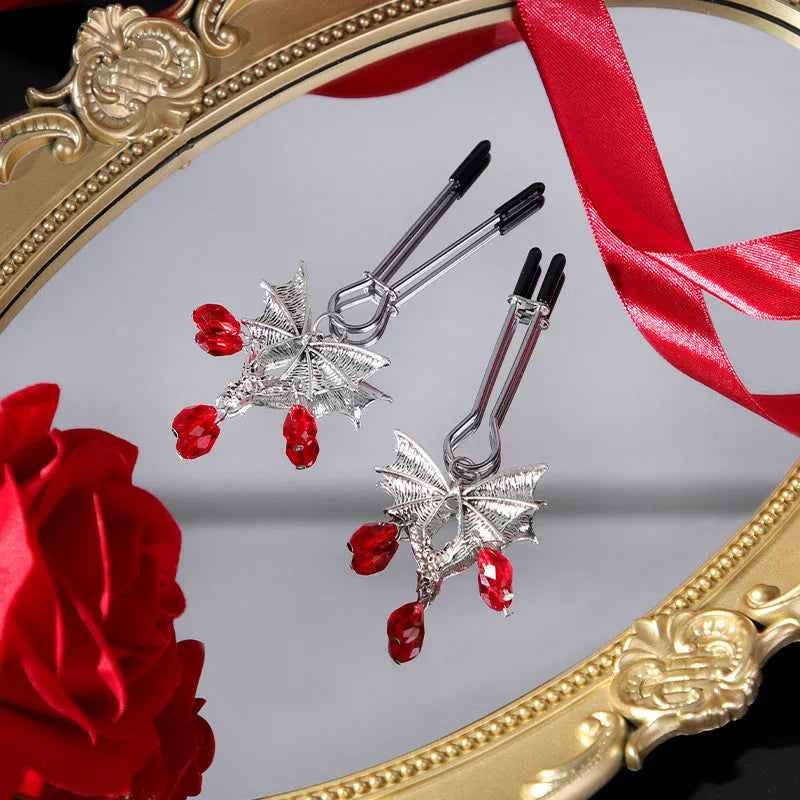 Silver bat nipple clamp with adjustable mechanism and ruby bat clip design