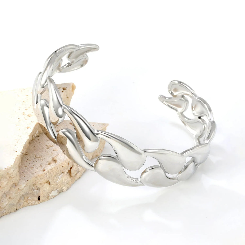 Stainless steel advanced style bracelet in one of three colour options on a white background.
