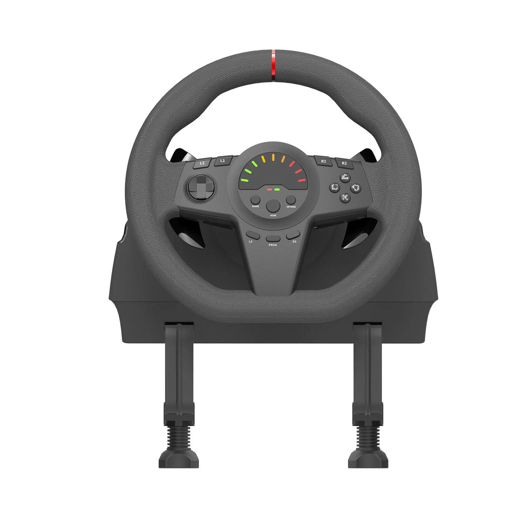 Black multi-platform game steering wheel with two pedals and paddle shifters on a desk.
