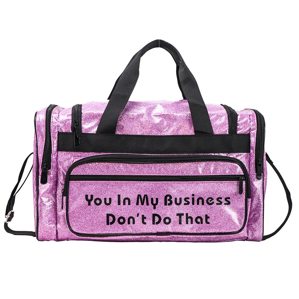 PU leather sports handbag in silver colour showing large capacity interior and organisational compartments