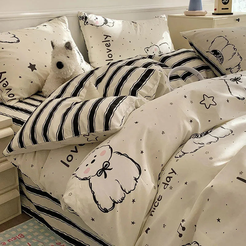 Cartoon dog pattern on a pure cotton duvet cover and pillowcase set, laid on a bed.