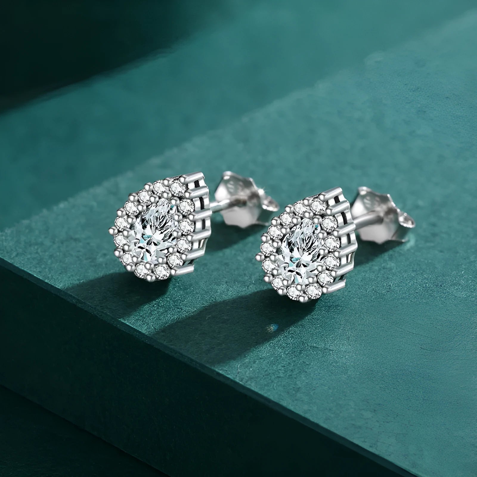 Women's silver water drop ear studs made from 925 sterling silver.