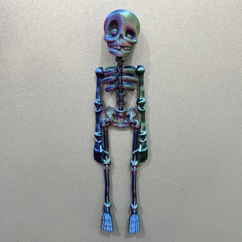 3D printed white skull fridge magnet ornament measuring 18cm tall on a refrigerator door.