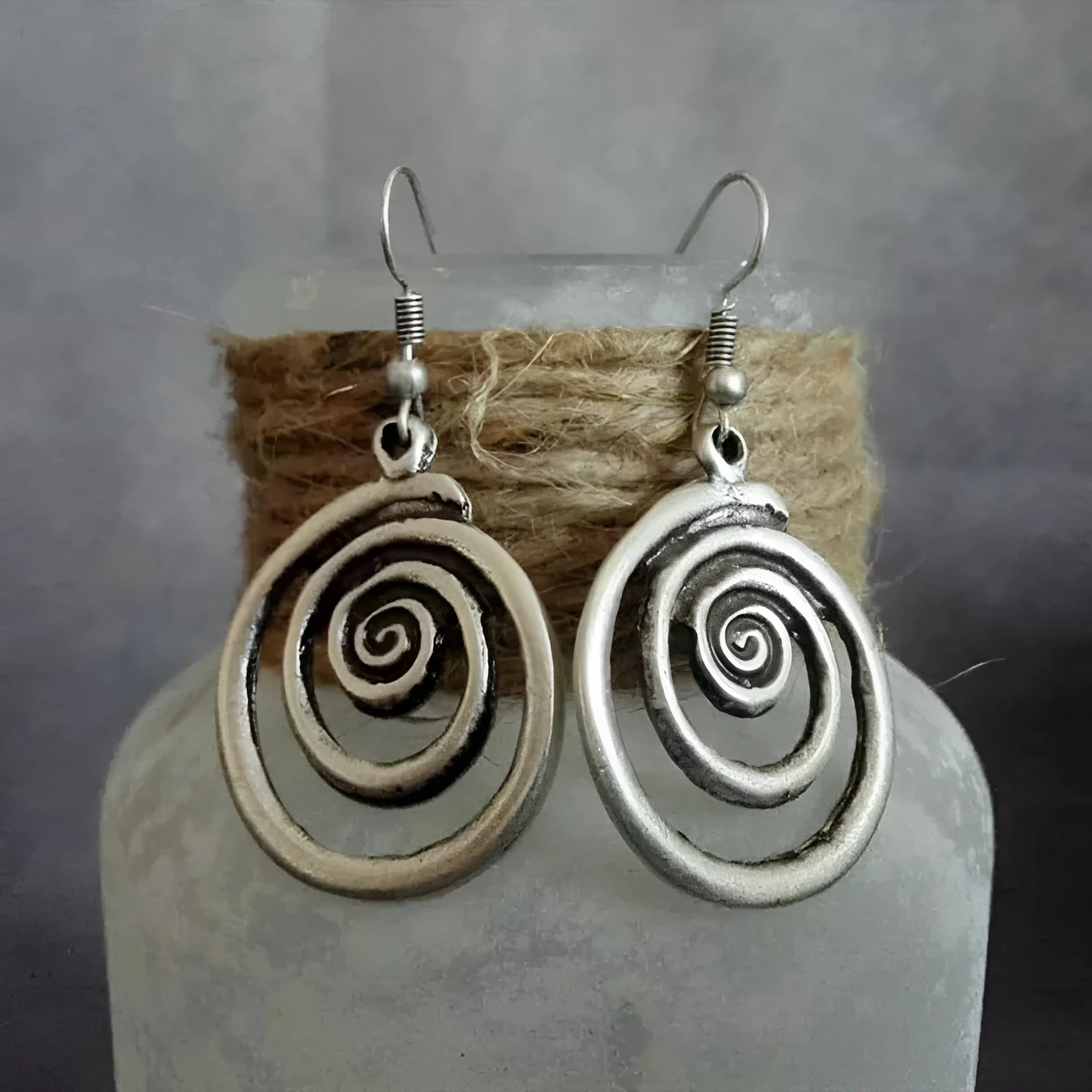 Retro geometric spiral distressed silver alloy earrings measuring 2.6cm by 5cm