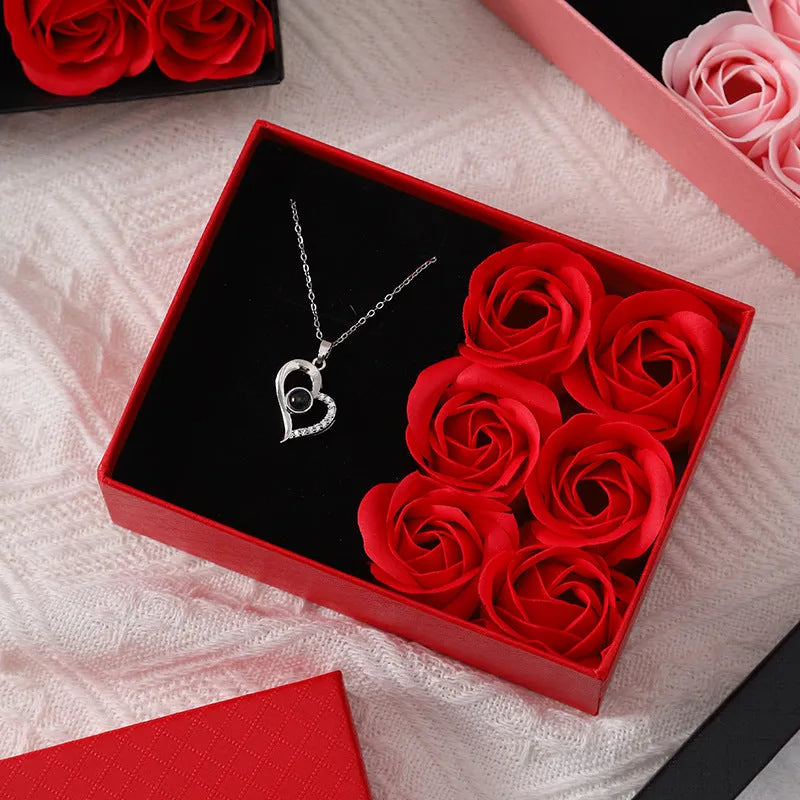 Six red soap roses in a black gift box with a matching handbag, a Korean style Valentine's gift set.