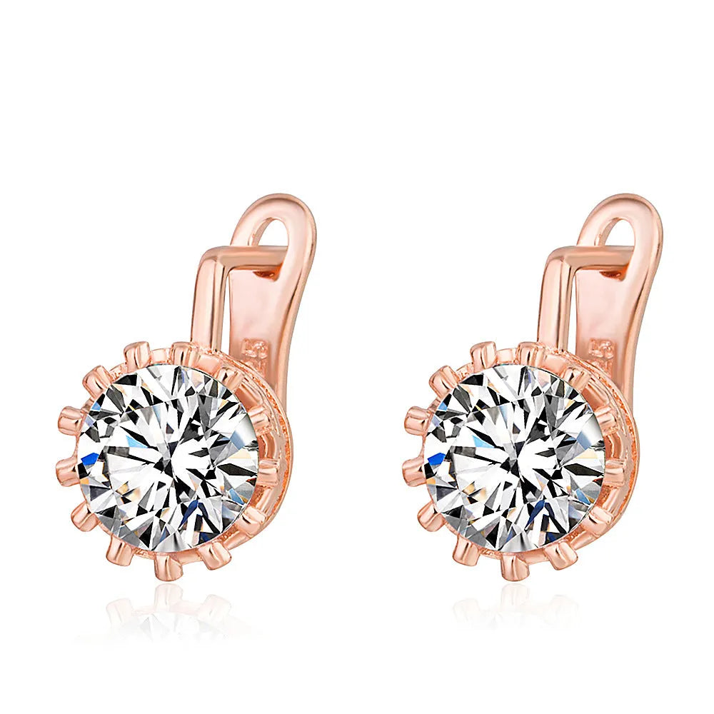Korean retro style crown-shaped clip-on earrings with white diamond accents on a rose gold or white gold coloured finish.