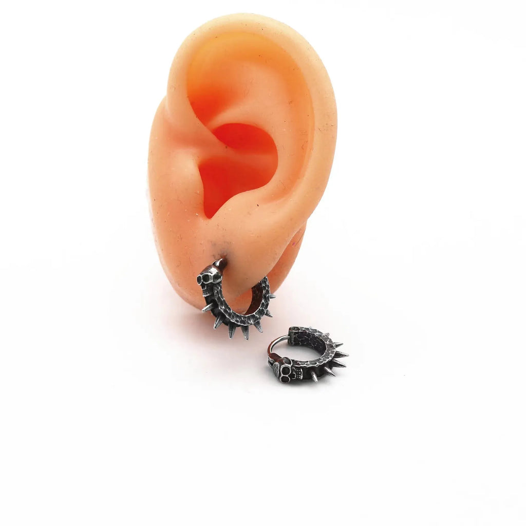 A pair of retro black geometric alloy earrings with a copper plastic punk motorcycle design theme.