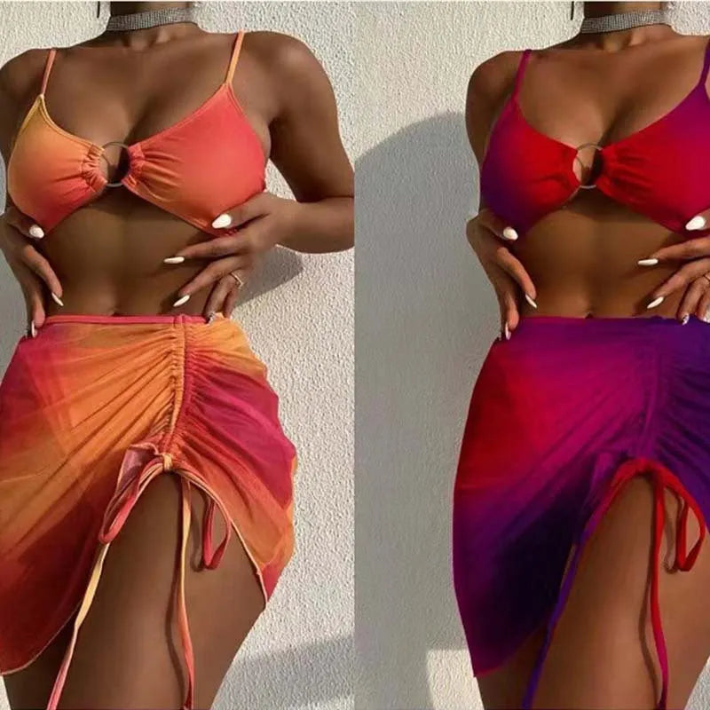 Women's orange and purple gradient print swimsuit with hollow suspender and loop buckles