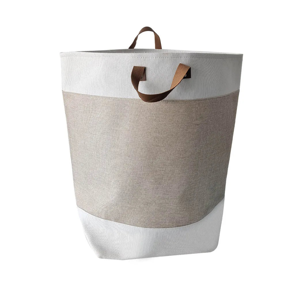 35cm cubed fabric storage bag in a colourful bear print, shown containing a folded quilt.