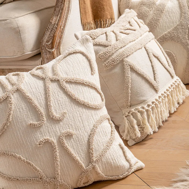Knitted decorative cushion cover with tassel fringe in spiral dots pattern showing 45x45cm size