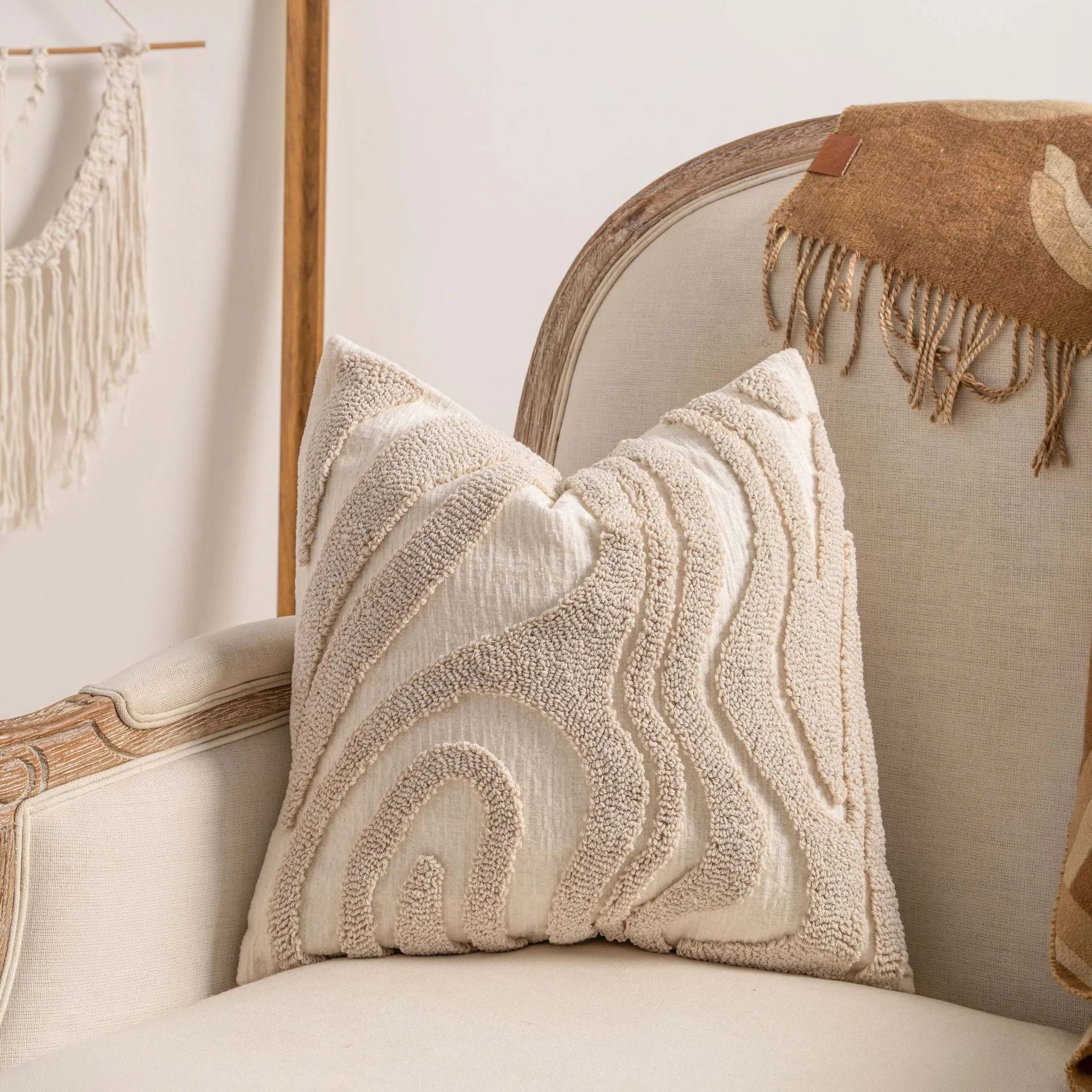 Knitted decorative cushion cover with tassel fringe in spiral dots pattern showing 45x45cm size