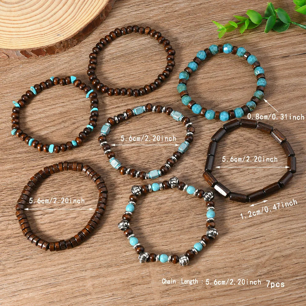 Set of seven layered retro bracelets with wooden beads, alloy metal, and multicolour stones.