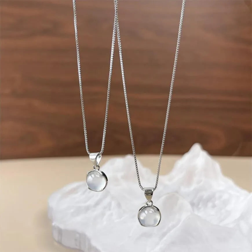 Women's Korean-style oval artificial crystal star pendant necklace on an adjustable box chain.