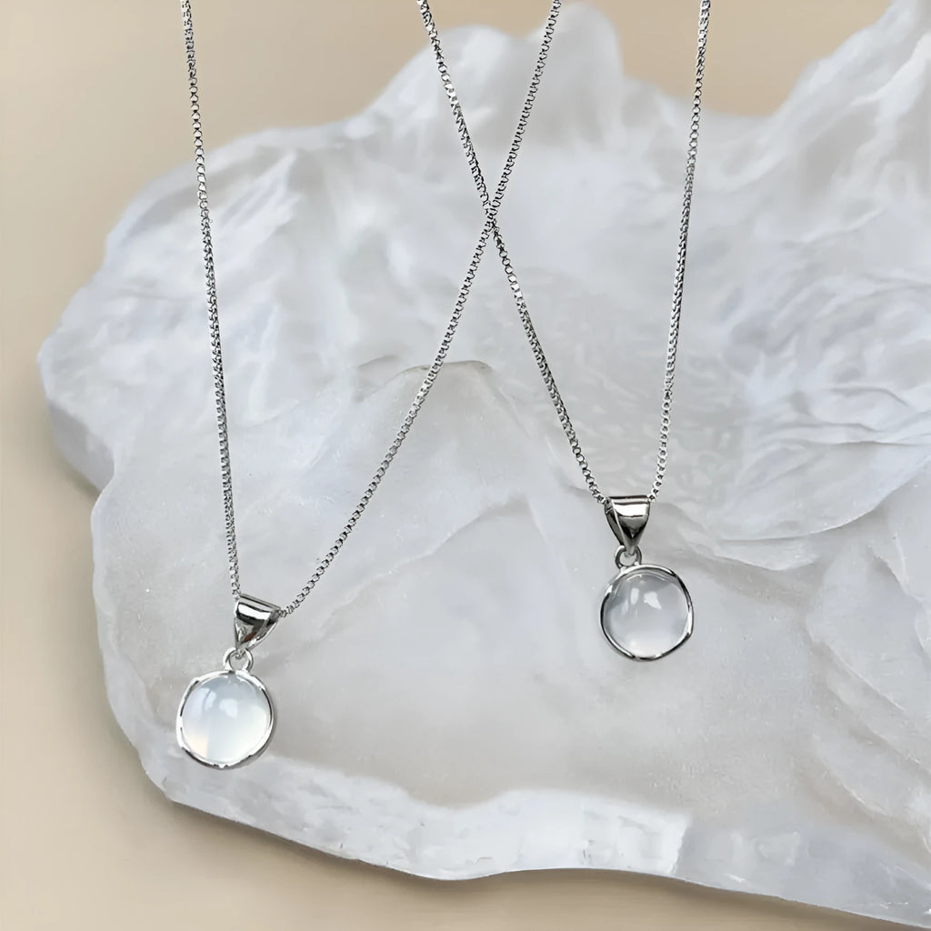 Women's Korean-style oval artificial crystal star pendant necklace on an adjustable box chain.