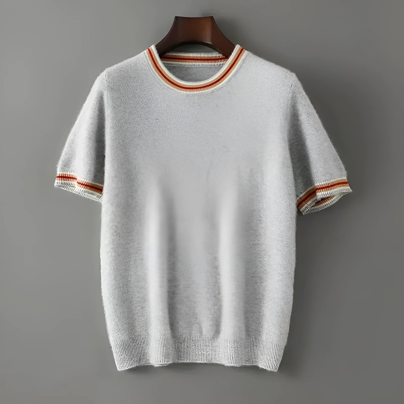 Men's short sleeve round neck wool sweater in grey on a hanger