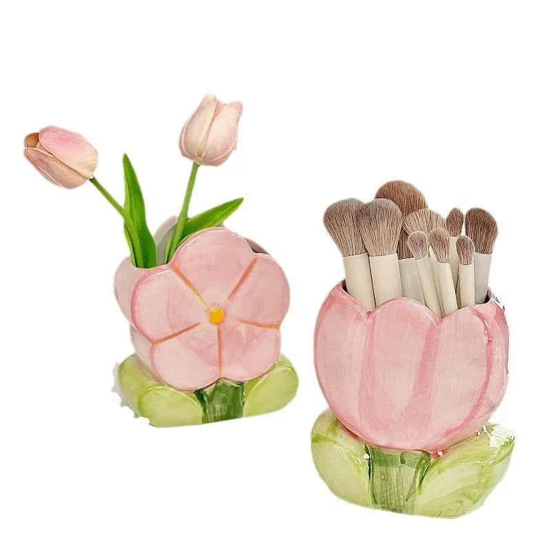 Ceramic pen holder box with floral pattern for desk organisation.