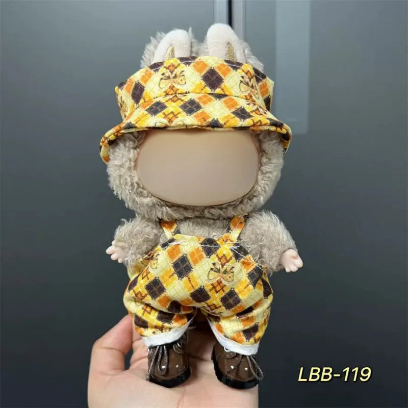 Plastic doll costume for a 17cm tall vinyl figurine on a white background.