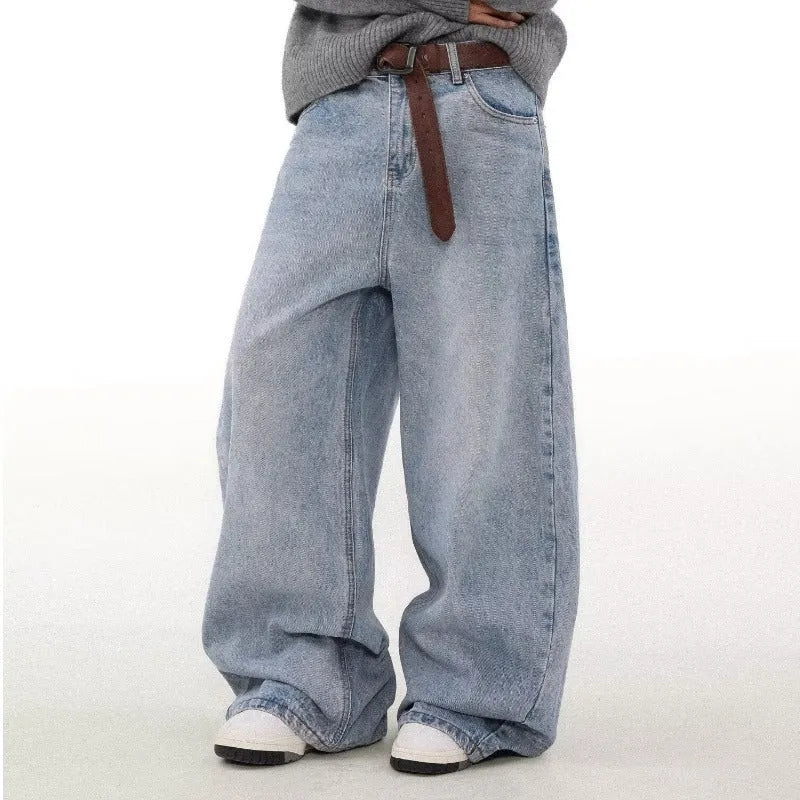 Men's blue straight leg jeans with distressed detailing and micro-elastic fabric