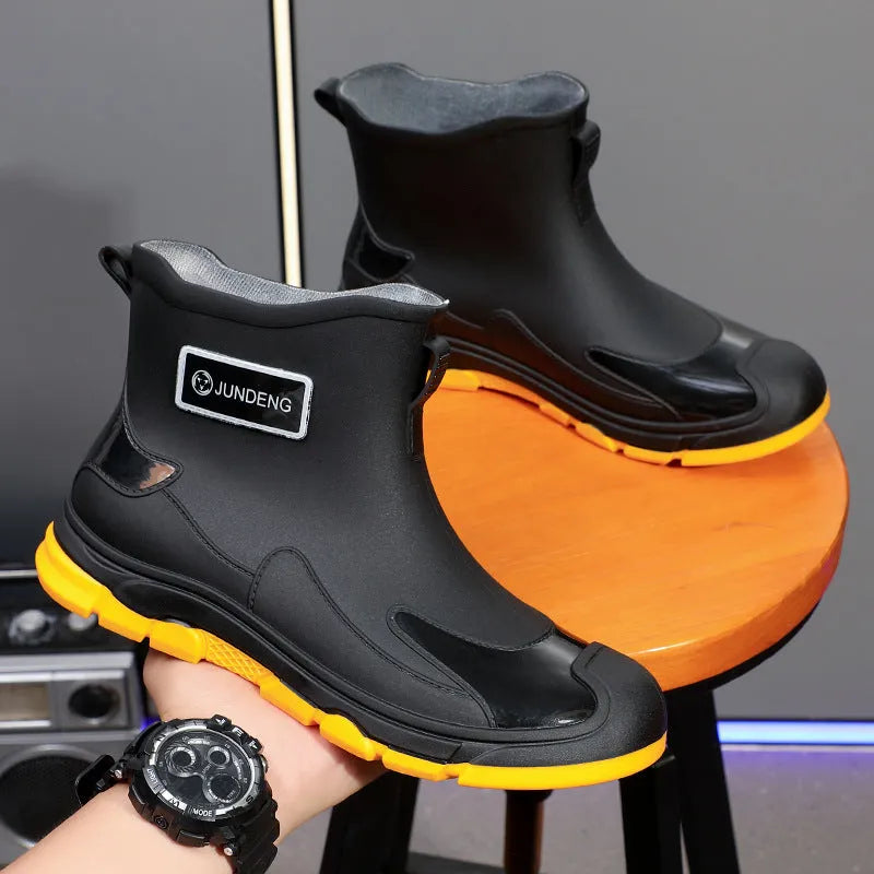 Adult low-cut waterproof wellington boots in PVC with an integrated moulded sole, shown in khaki colour.