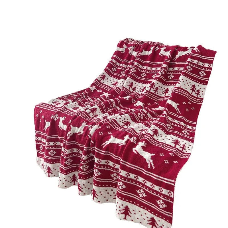Personalised acrylic Christmas blanket with reindeer or snowflake pattern in two size options.