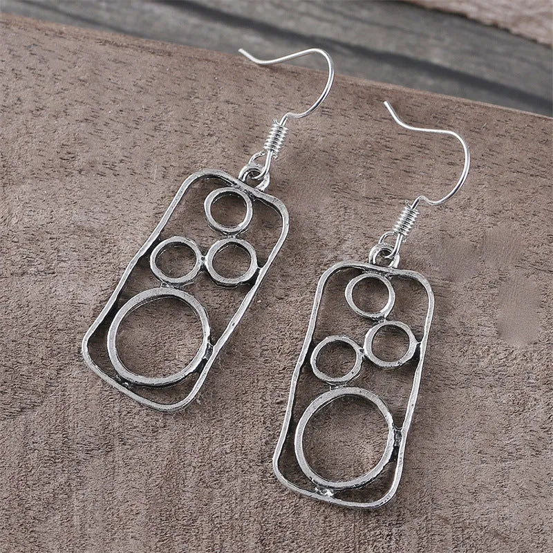 Geometric round ring earrings with irregular square design in antique silver colour