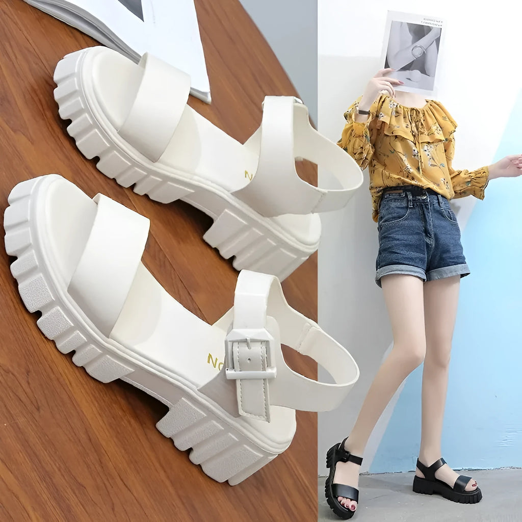 Women's beige platform sandals with peep toe and ankle-strap buckle on white background